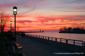 Grand Haven Boardwalk photo at Sunset for The Village Green of Grand Haven, MI 49417. A manufactured home community.