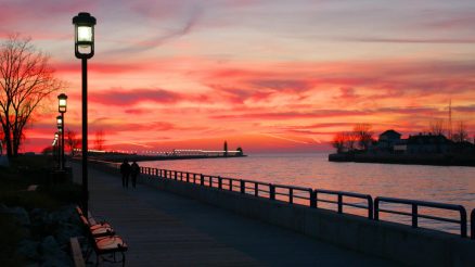 Grand Haven Boardwalk photo at Sunset for The Village Green of Grand Haven, MI 49417. A manufactured home community.